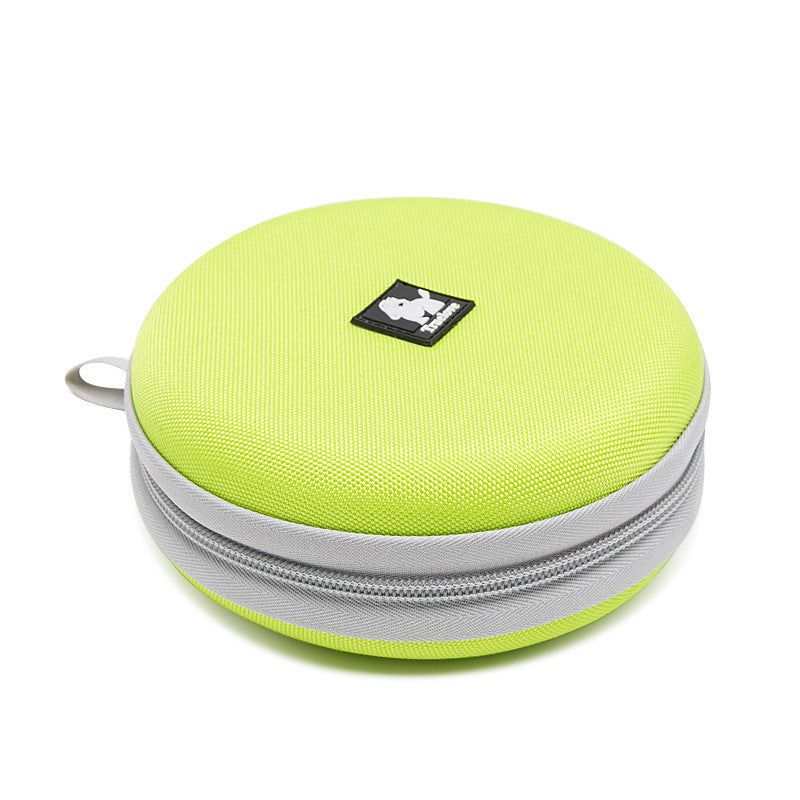 Bol de nourriture et d'eau pliable pour chiens, idéal pour les voyages, couleur verte, design pratique.