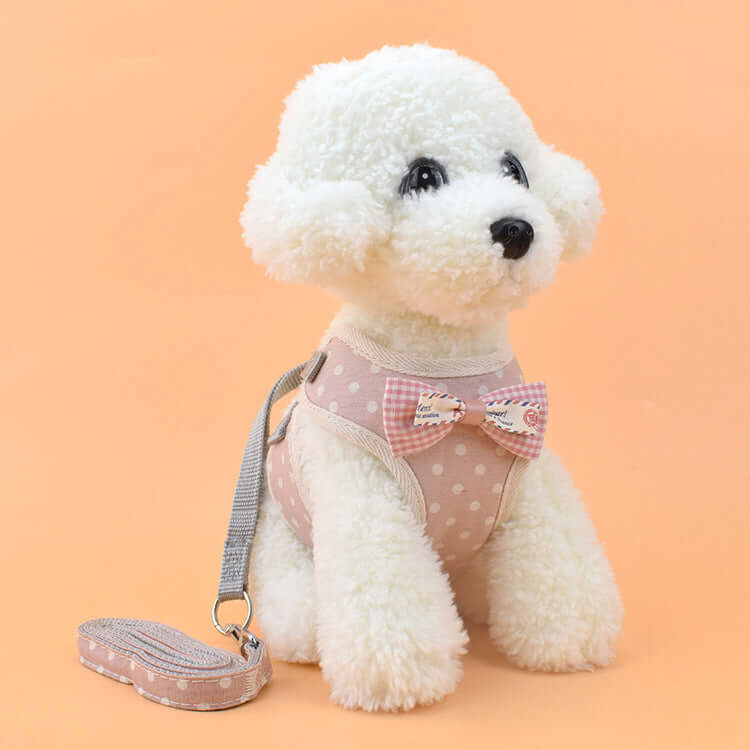 Harnais pour chien et chat avec laisse, confortable et pratique en tissu léger et résistant, avec nœud papillon.