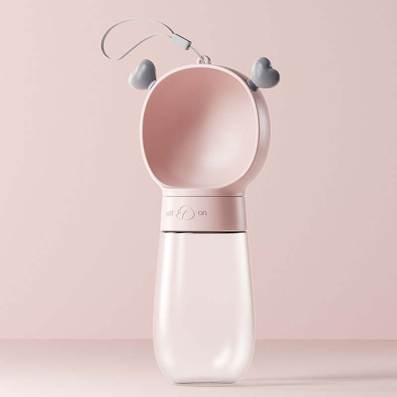 Gobelet d'eau portable pour chiens avec design pratique et fonctionnel, idéal pour hydrater votre animal en promenade.