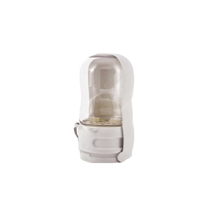 Bol portable pliable pour chiens avec fontaine intégrée, idéal pour l'hydratation lors des aventures en plein air.