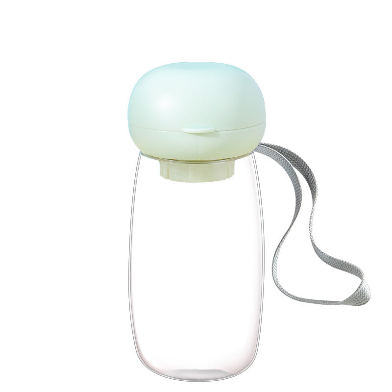 Gourde portable pour animaux de compagnie avec lanière, idéale pour hydrater chiens et chats lors des aventures en plein air.