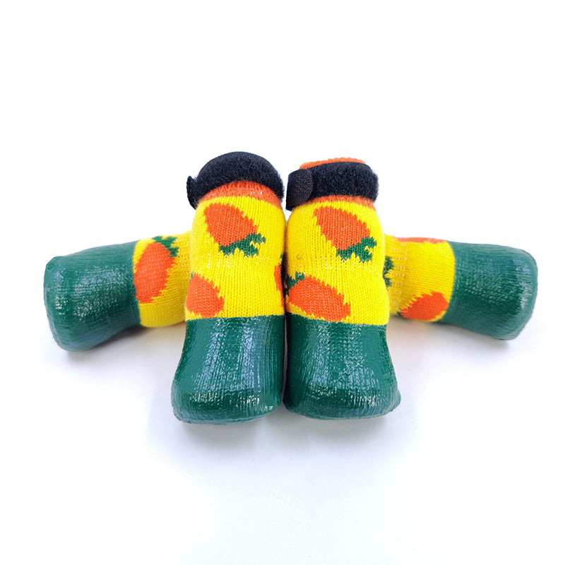 Chaussettes antidérapantes et imperméables pour chiens en coton, avec motif d'orange et semelle verte.