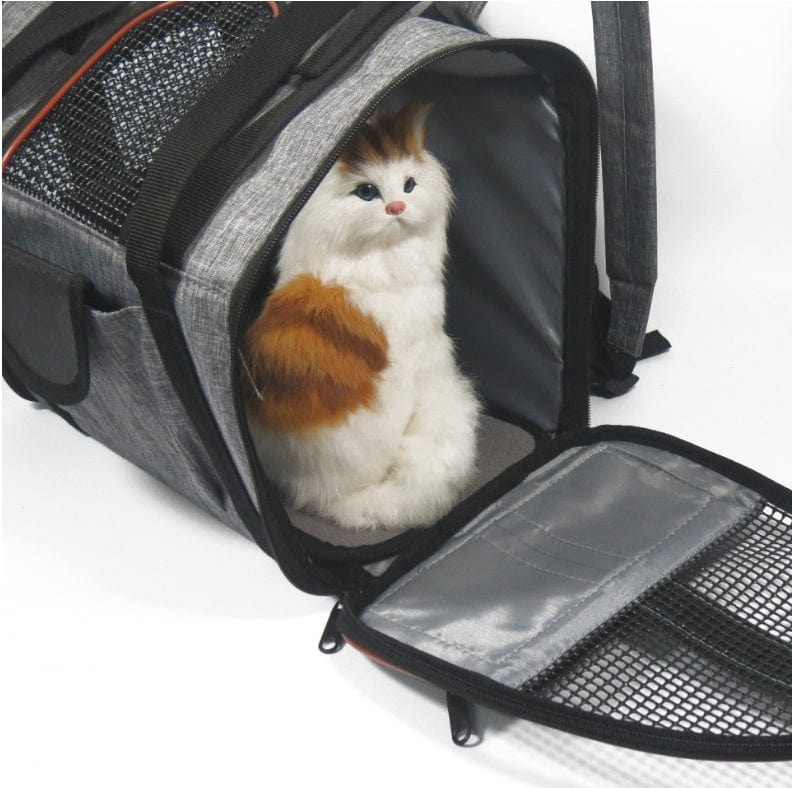 Panier de transport multifonctionnel pour animaux avec un chat en peluche à l'intérieur, design moderne et durable.