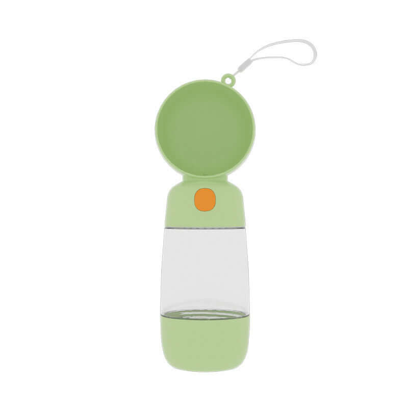 Gourde portable pour chien en plastique vert avec couvercle et système de distribution d'eau.