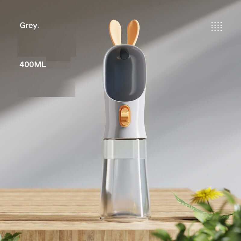 Gobelet portable pour animaux, couleur gris, capacité 400ml pour nourriture et eau en extérieur.
