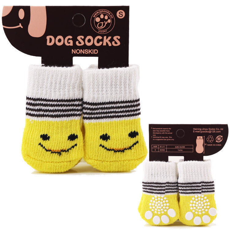 Chaussettes non-skid pour chiens en jaune et blanc, ensemble de 4, parfait pour le confort des pattes de vos animaux.
