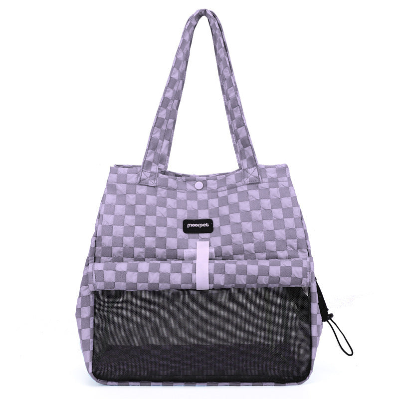 Sac à dos portable à motifs carreaux, conçu pour transporter facilement les animaux de compagnie en toute sécurité.