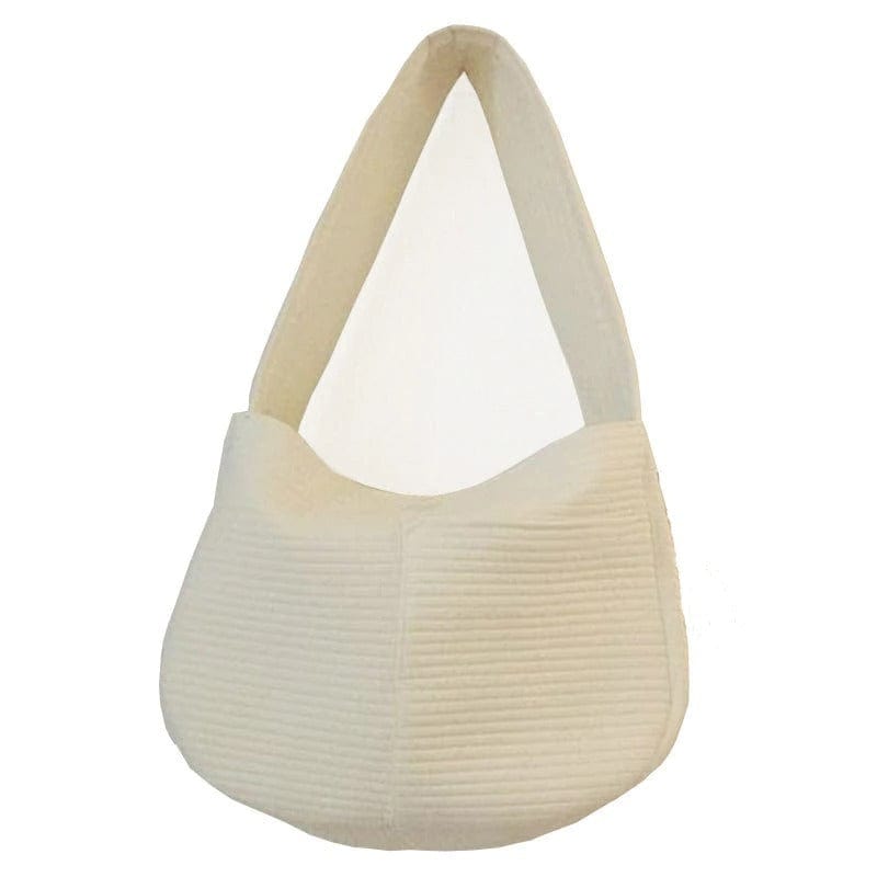 Sac de transport en coton blanc pour chiots et chats, idéal pour un voyage confortable.