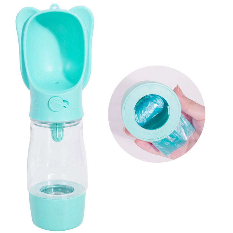 Bol d'eau portable pour chien en plastique turquoise avec cuvette intégrée et compartiment pour sacs à déjections canines.