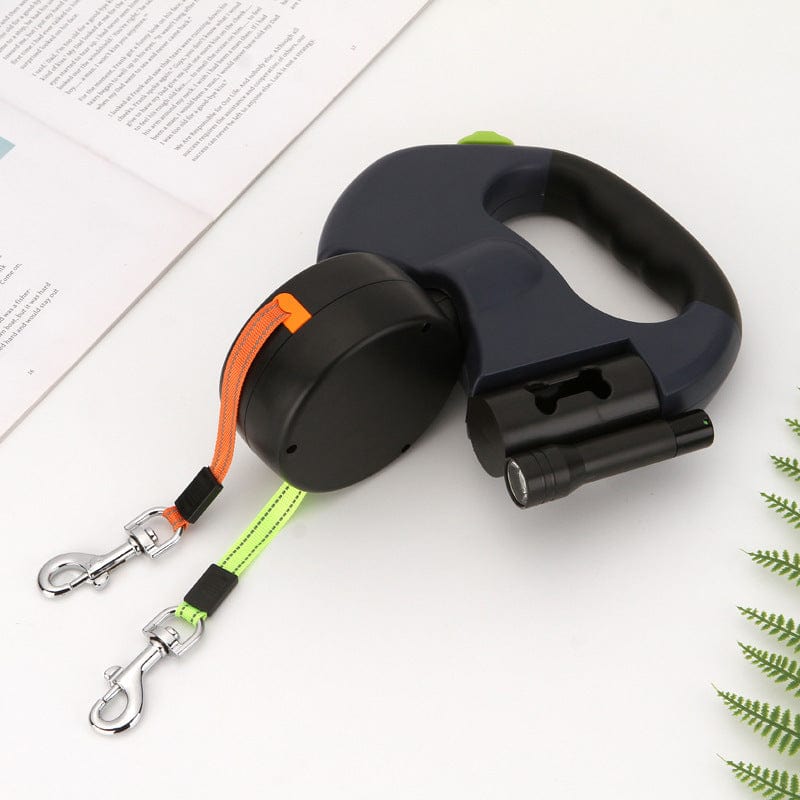 Laisse à chiens double tête multicolore avec poignée ergonomique et clips pour attacher les chiens.