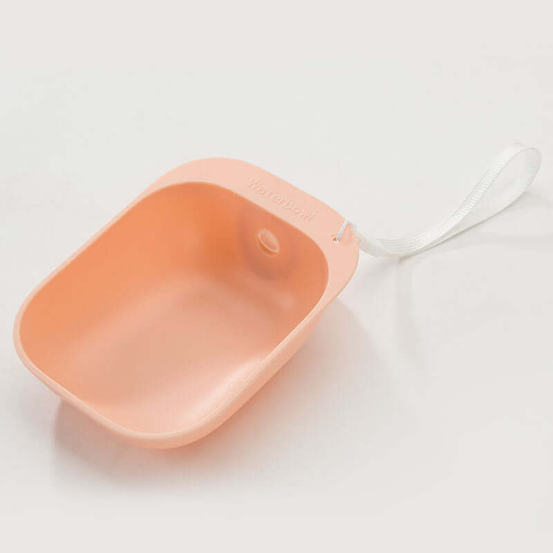 Gourde portable Teddy pour animaux, design léger et ergonomique, couleur rose, pratique pour l'hydratation des animaux.