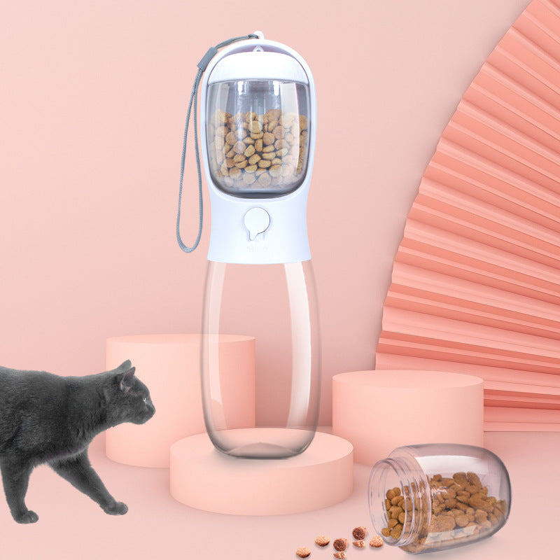 Gobelet portable pour animaux de compagnie avec croquettes, idéal pour chiens et chats en balade.