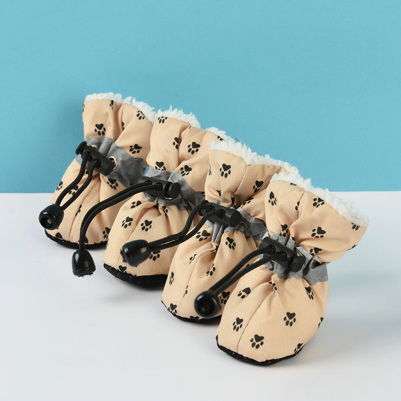 Chaussures imperméables et antichoc pour chiens, confortables et élégantes, avec motif empreinte de patte.