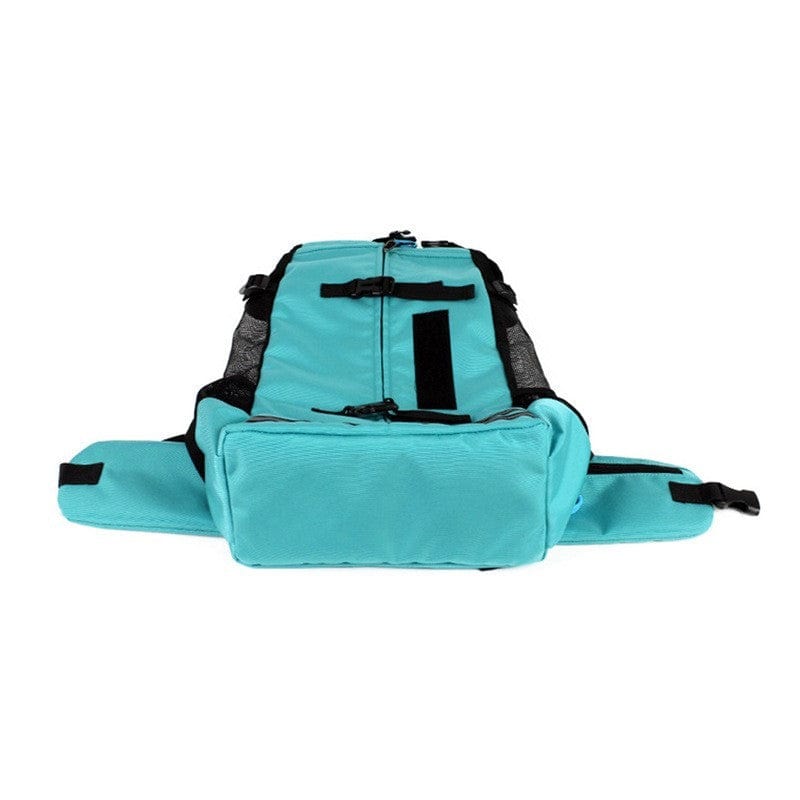 Sac à dos pour animaux de compagnie respirant en tissu durable, coloris turquoise, avec poches et maille.