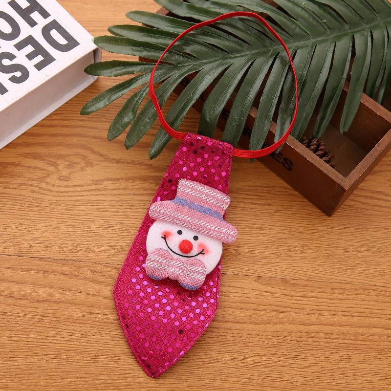 Décoration de cravate en sequins roses avec bonhomme de neige pour Noël, accessoire festif idéal pour les célébrations.