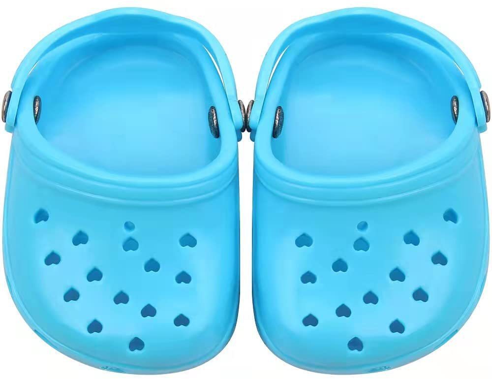 Chaussures pour chien en silicone bleu avec trous en forme de cœur pour ventilation et style.