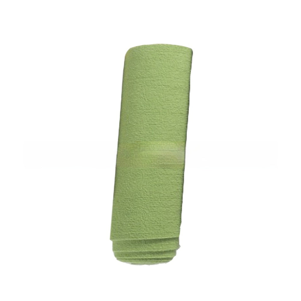 Tapis grattage auto-adhésif vert pour chats, conçue en tissu durable et confortable.