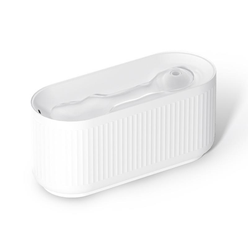 Distributeur d'eau sans fil pour chats, design élégant et moderne en ABS, parfait pour l'hydratation féline.