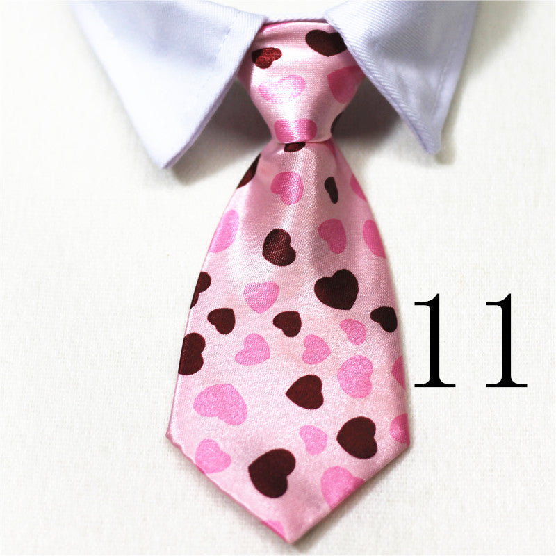 Nœud papillon rose à motifs cœurs pour animaux, parfait pour chiens et chats, en coton doux.