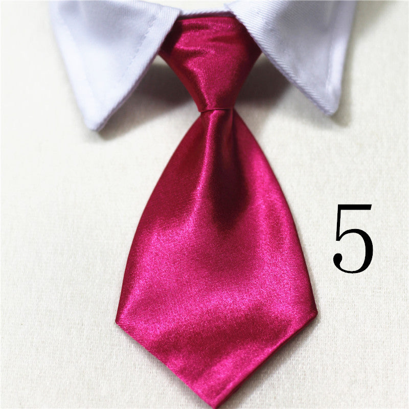 Nœud papillon rose en satin pour chiens et chats, accessoire élégant pour animaux, couleur unie, style chic.