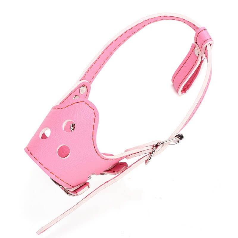 Muselière ajustable pour petits chiens en cuir rose, résistante et confortable pour la sécurité de votre animal.