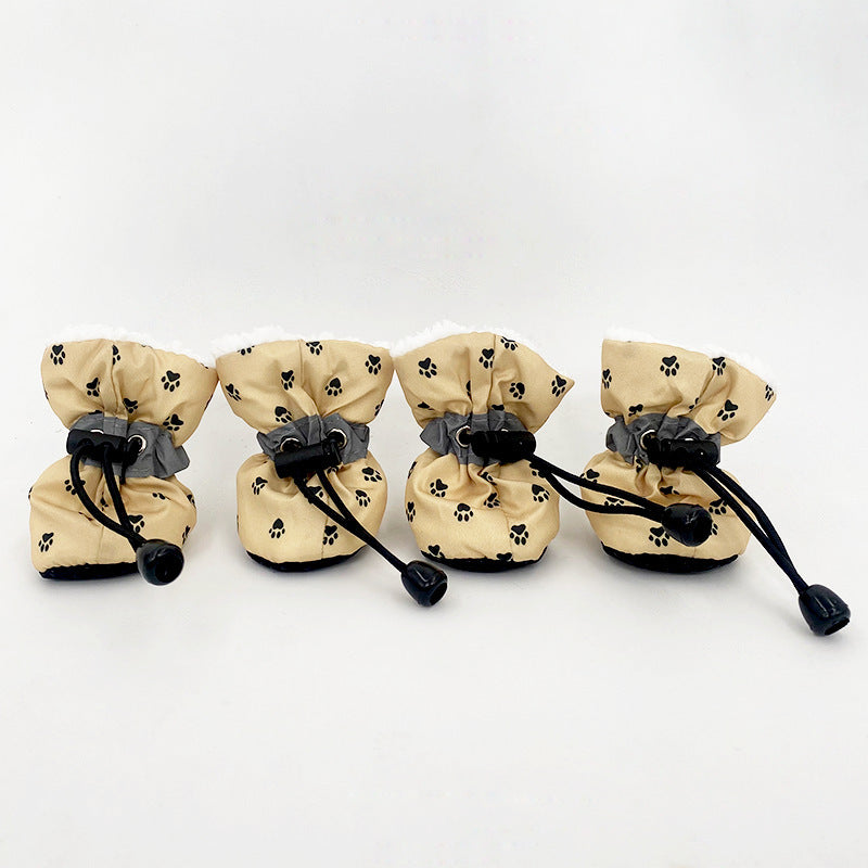 Chaussures imperméables et antichoc pour chiens, en tissu de haute qualité avec motif de pattes.