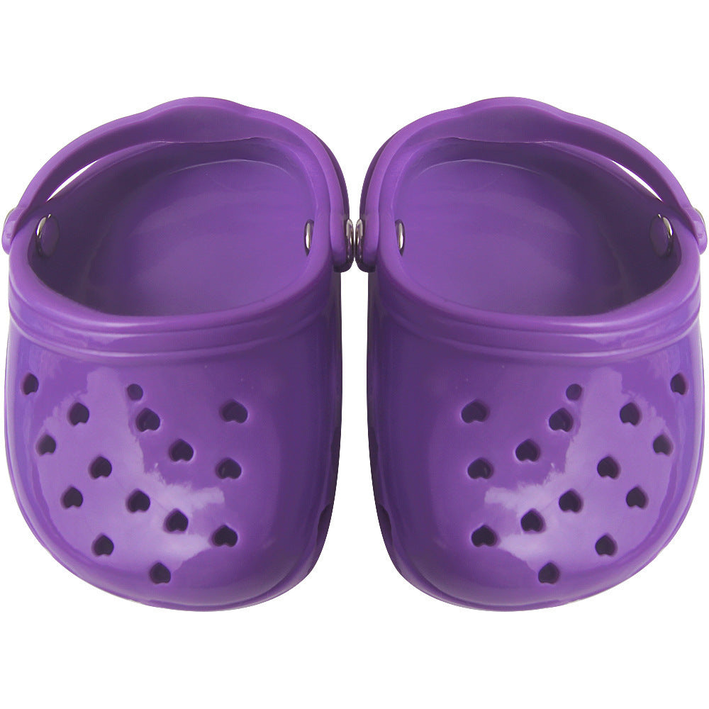 Chaussures pour chien en silicone violet avec trous pour ventilation, résistantes à l'usure et élégantes.