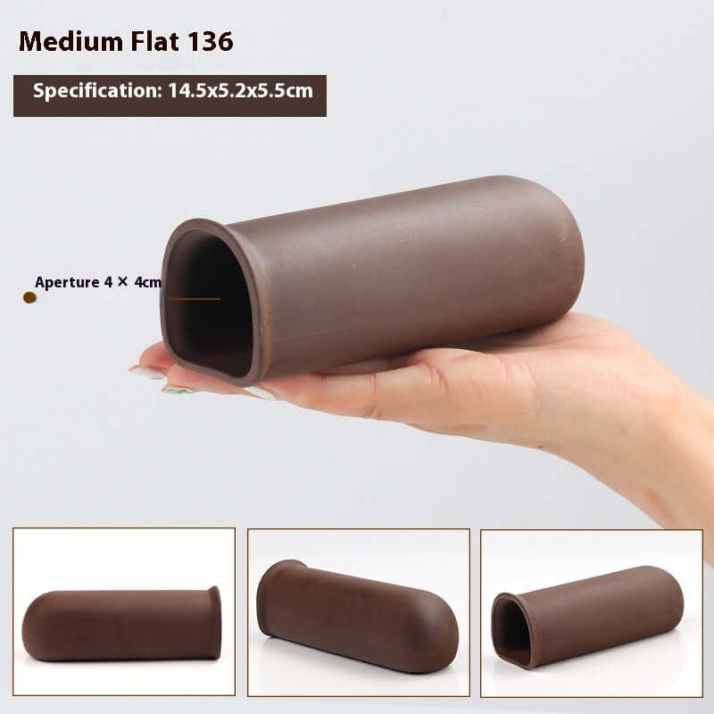 Medium Flat 136 measurement 14.5x5.2x5.5cm, brown tubular shape held in hand, designed for various uses.
