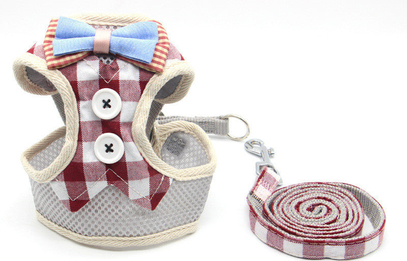 Harnais de traction pour chat à carreaux rouges et gris avec laisse assortie, idéal pour promenades sécurisées.