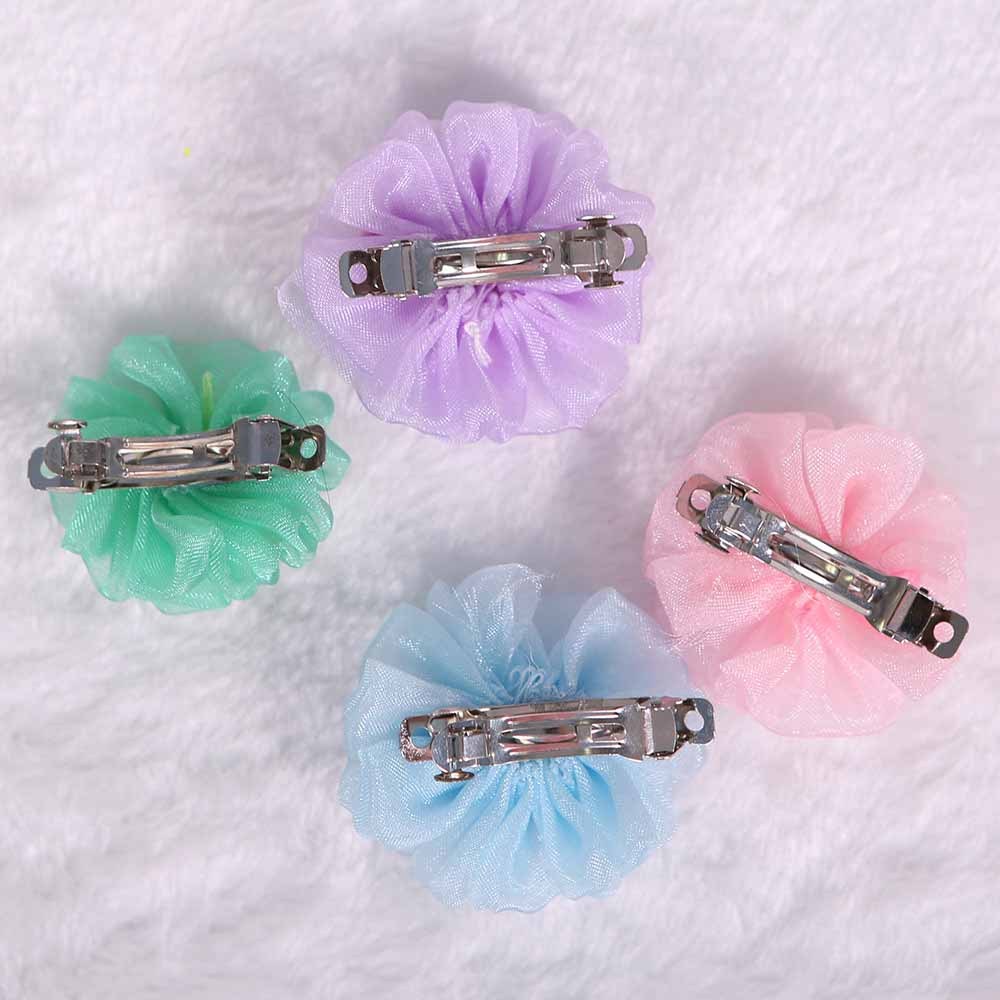 Épingles à cheveux en organza pour chien, disponibles en rose, vert, violet et bleu, pour un look stylé.