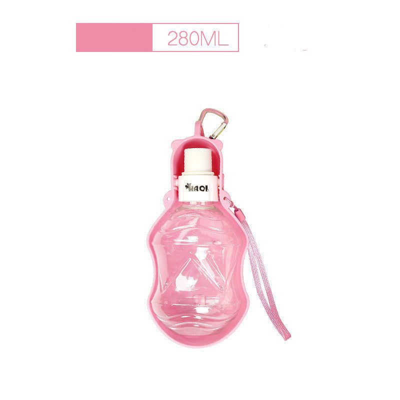 Bouteille d'eau portable pour chiens 280ml rose, idéale pour hydratation lors des aventures en plein air.