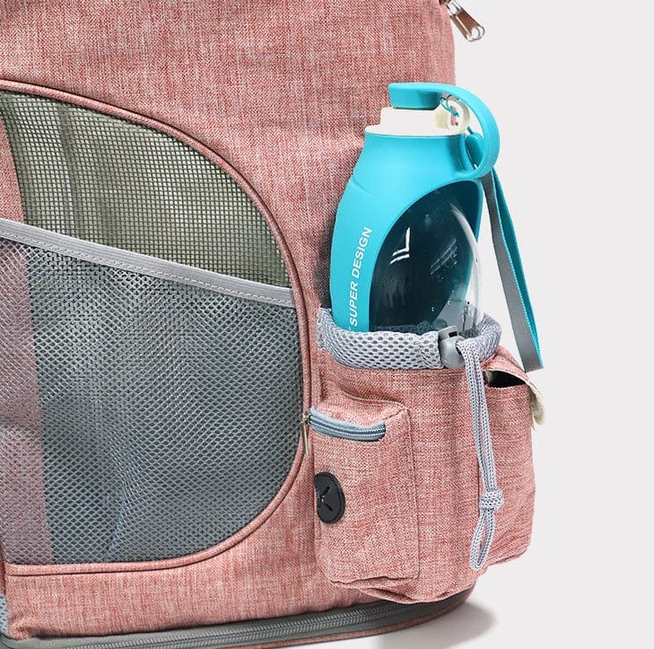 Sac de transport pour animaux avec poche latérale pour bouteille d'eau, design pratique et portable.