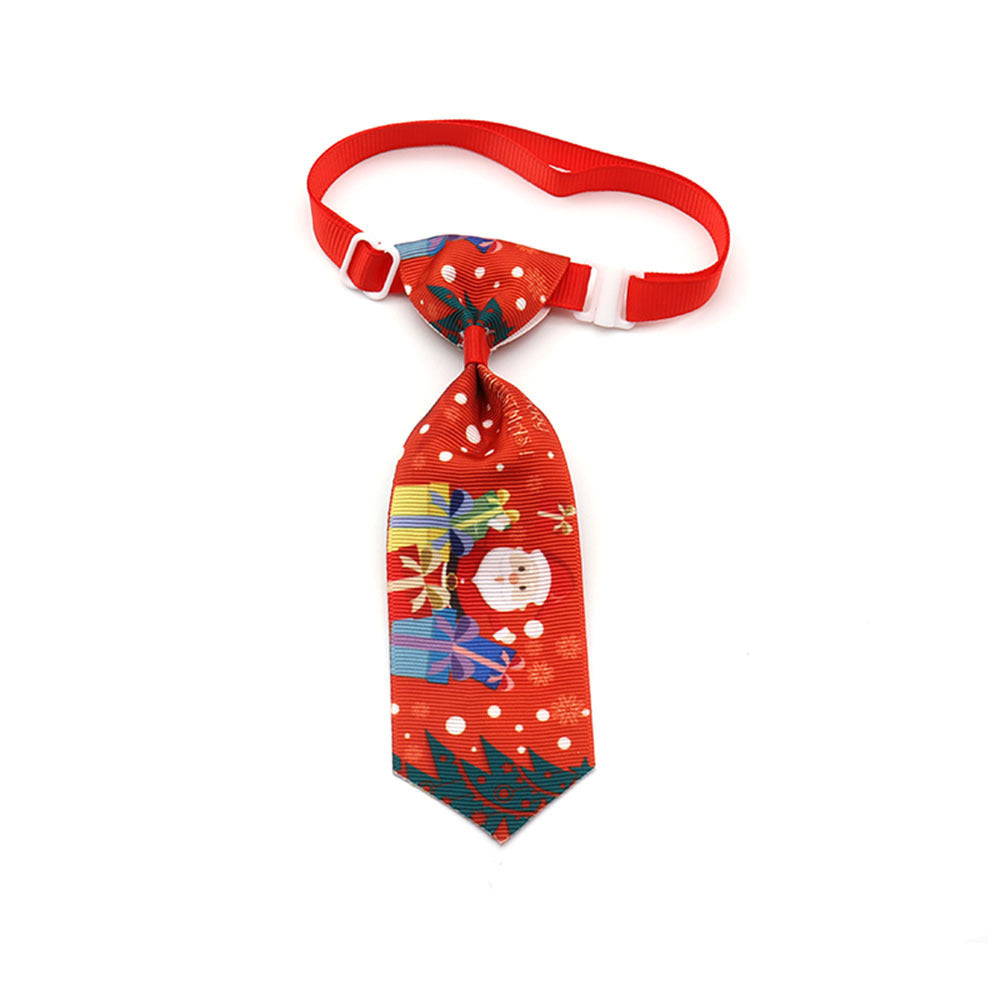 Nœud papillon de Noël rouge pour animaux avec motifs festifs et lien ajustable.