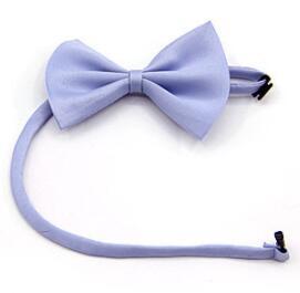 Nœud papillon simple en couleur lilas pour animaux, ajoutant une touche d'élégance pour toutes occasions.