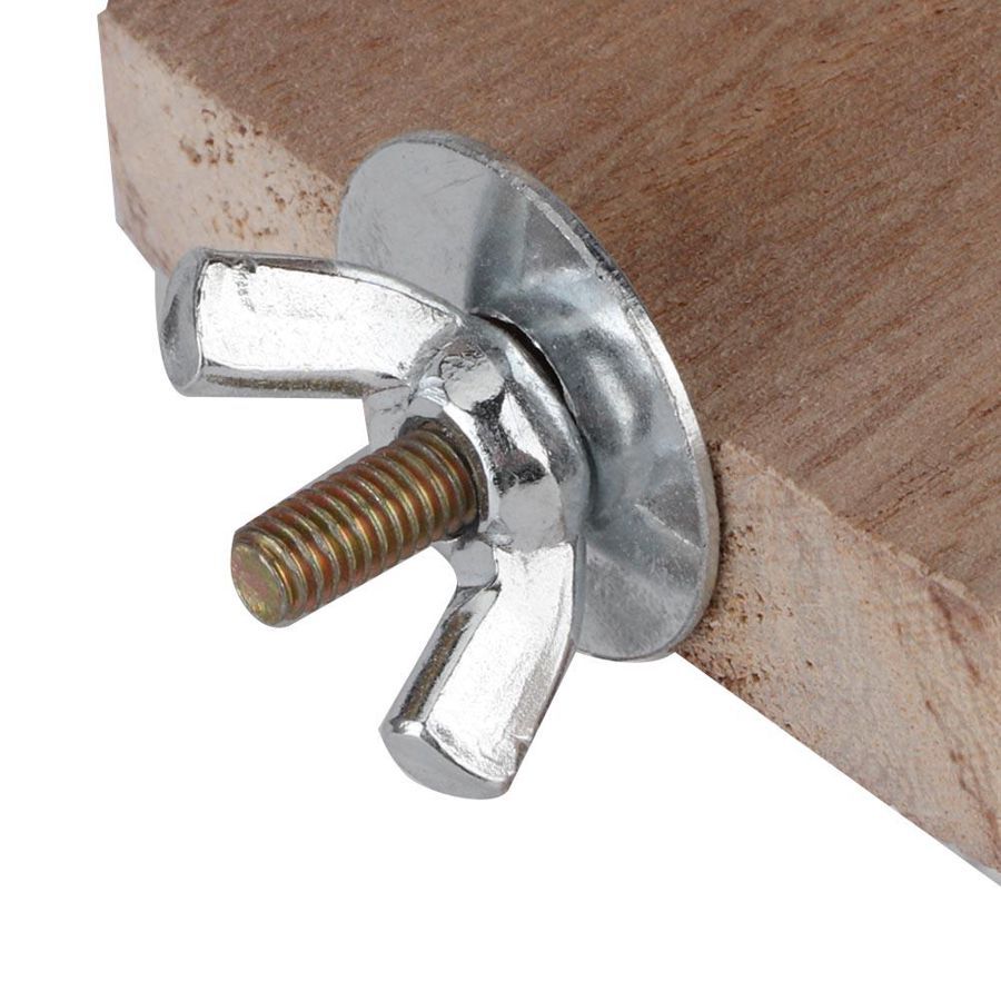 Close-up of a metal fastening with a threaded bolt attached to wooden surface for secure assembly.