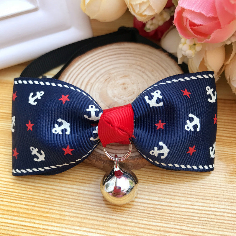 Nœud papillon en polyester avec cloche pour chien et chat, motif marine, élégant et amusant.