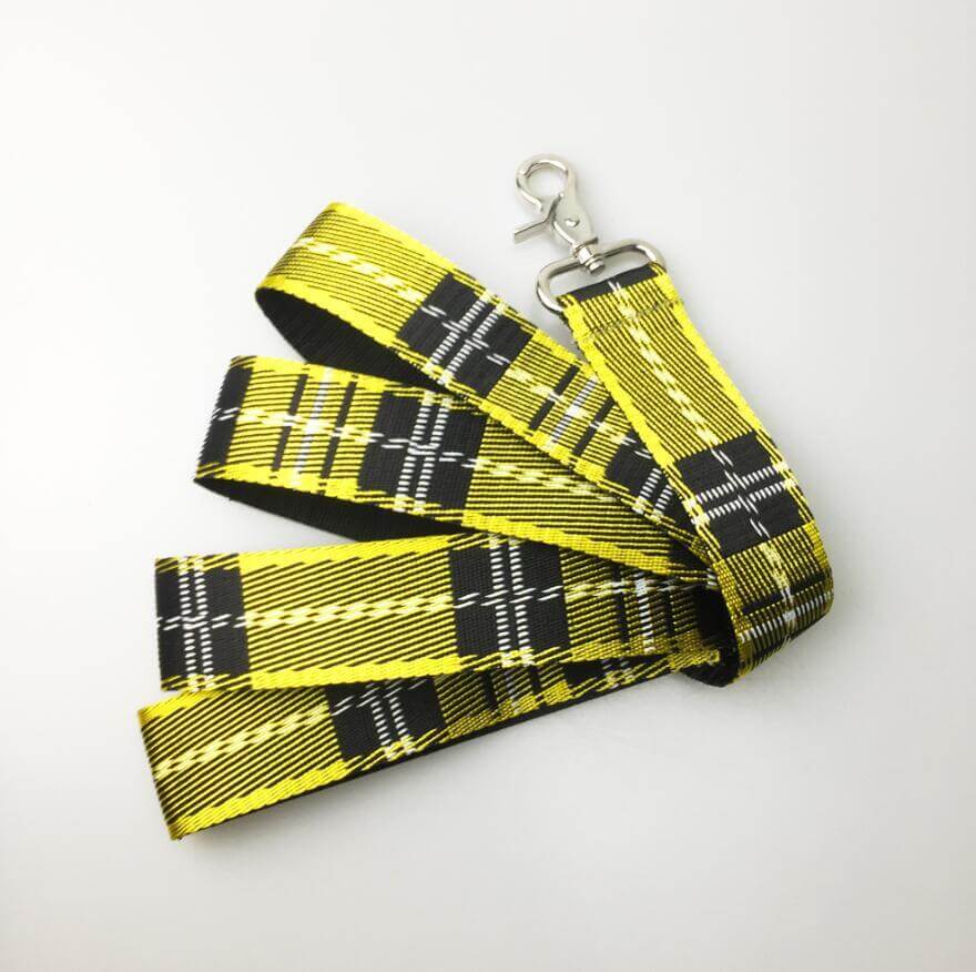 Laisse pour chien en nylon à motif écossais jaune et noir, idéale pour le confort et la sécurité des animaux.