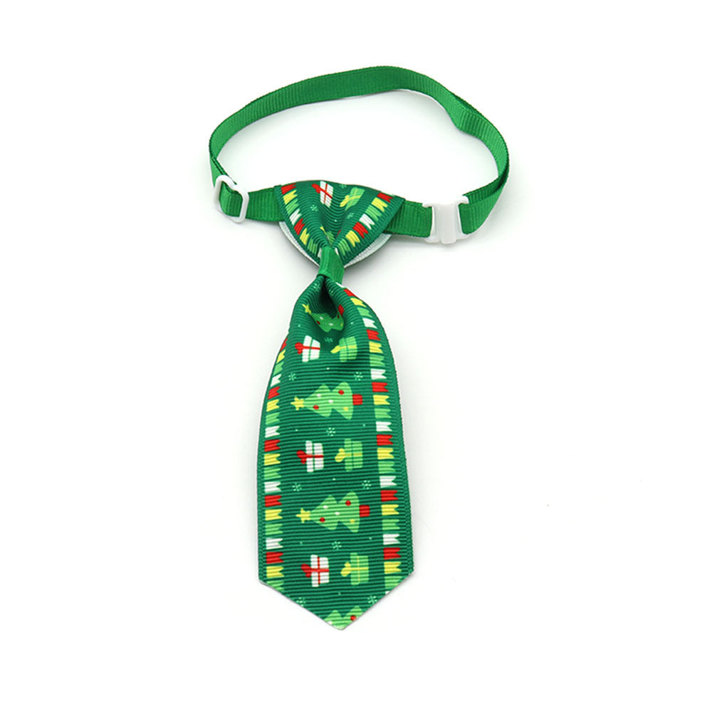 Nœud papillon de Noël vert avec motifs festifs pour animaux de compagnie, idéal pour les fêtes.