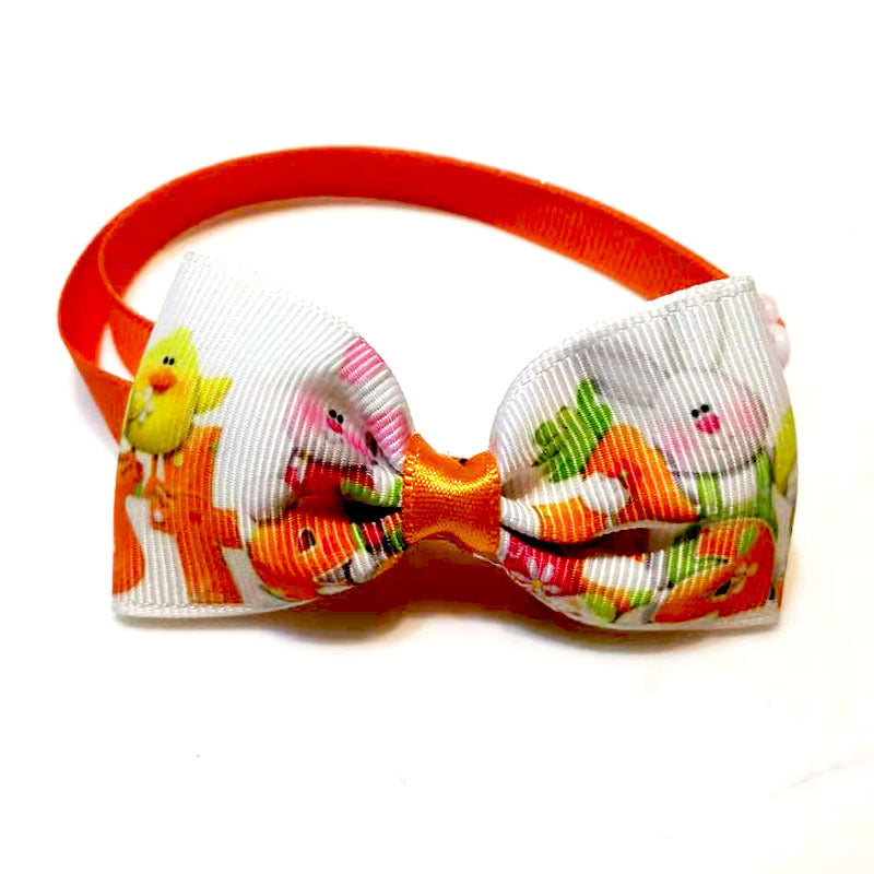 Set de Nœud Papillon de Pâques pour animaux avec motifs colorés et bande orange.