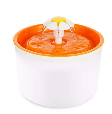 Fontaine à eau automatique pour chiens et chats, design moderne avec jets d'eau et réservoir blanc.