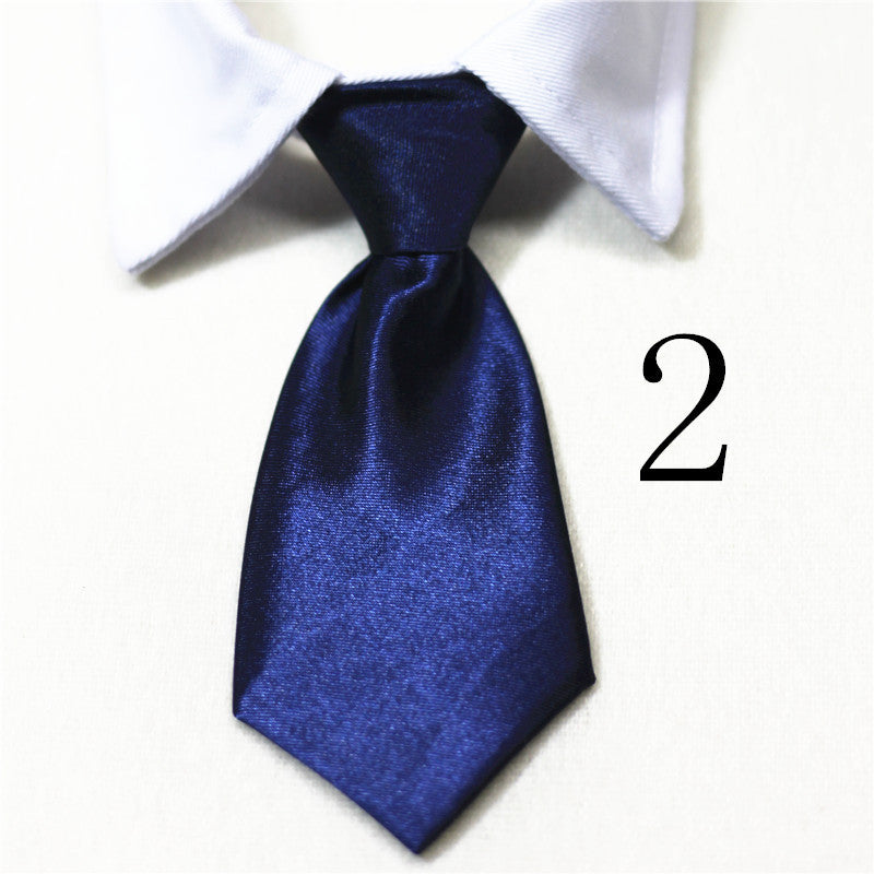 Nœud papillon en coton bleu marine pour chiens et chats, accessoire élégant et stylé.