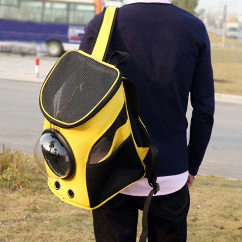 Sac à dos capsule astronaute jaune pour animaux, parfait pour chats et chiens lors des promenades.