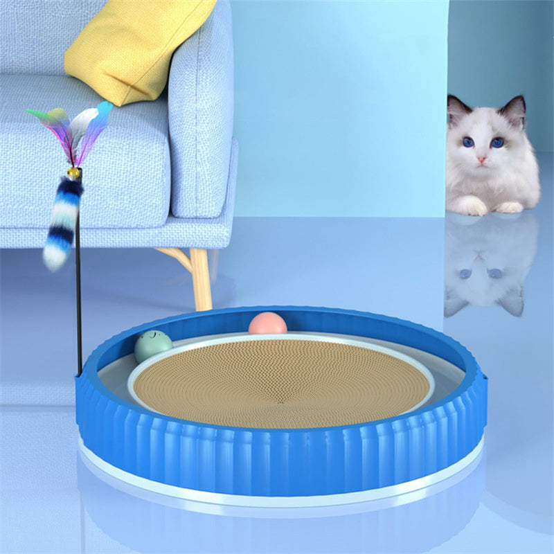 Planche à gratter ronde bleue pour chat avec jouets interactifs et coussin confortable.