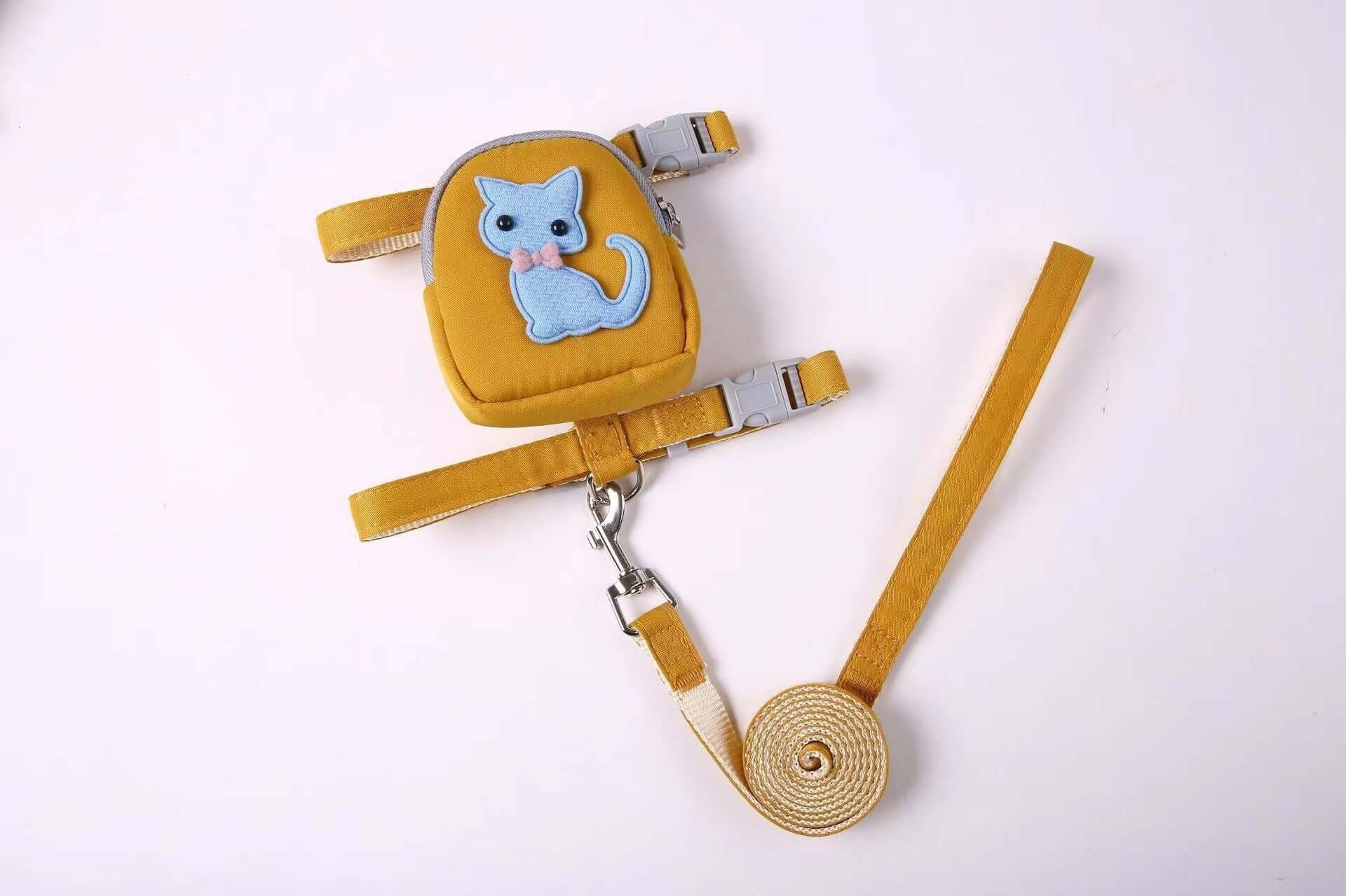 Sac à dos pour animaux avec harnais et corde de traction, design mignon de chat, couleur jaune.