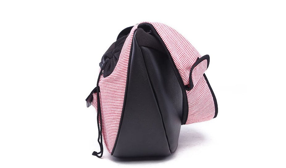Sac de voyage pour animaux en coton à rayures, offrant confort pour vos déplacements avec votre animal.
