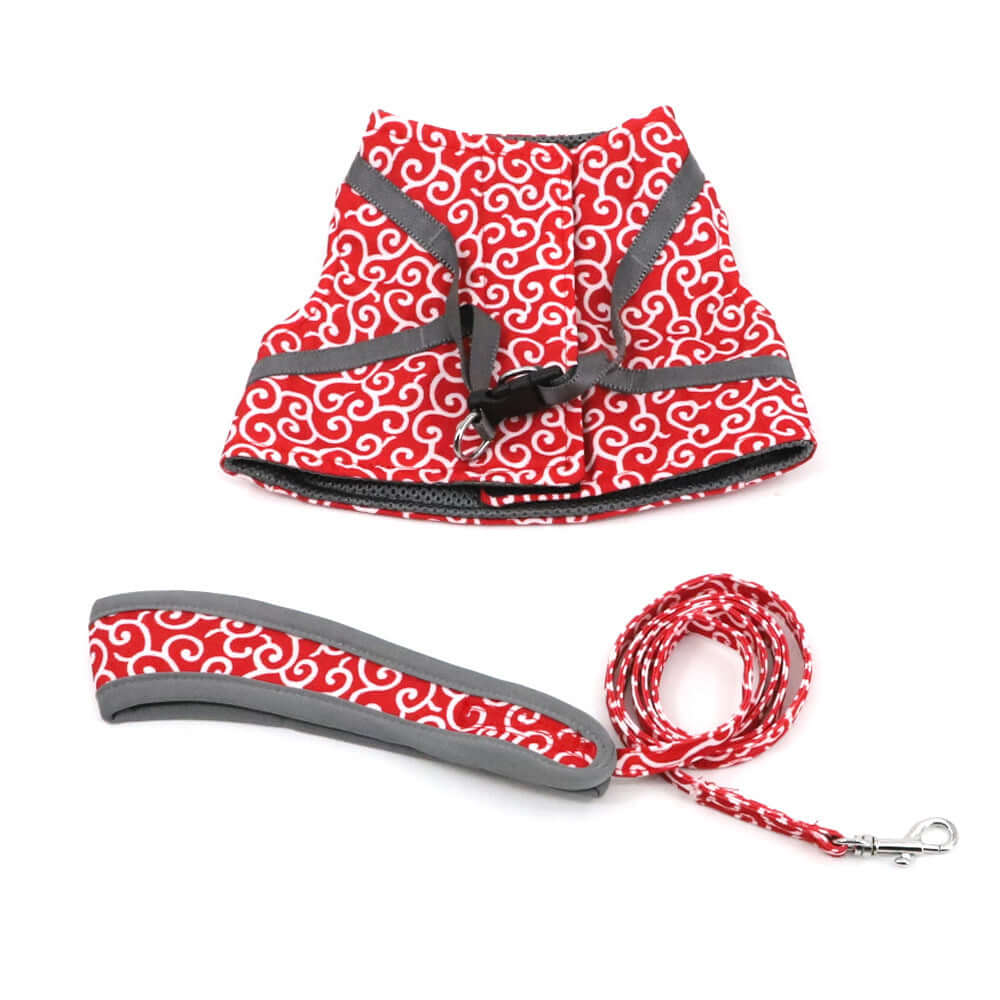 Gilet anti-évasion rouge pour chat et chien avec ceinture de traction, accessoire sécurisé et tendance.