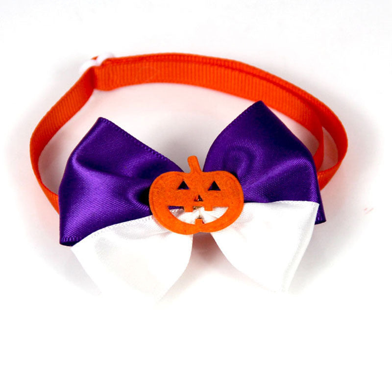 Nœud papillon Halloween orange et violet pour animaux avec motif de citrouille.