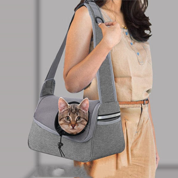 Sac à bandoulière pour animaux, avec un chat dans une pochette respirante, pratique et confortable.
