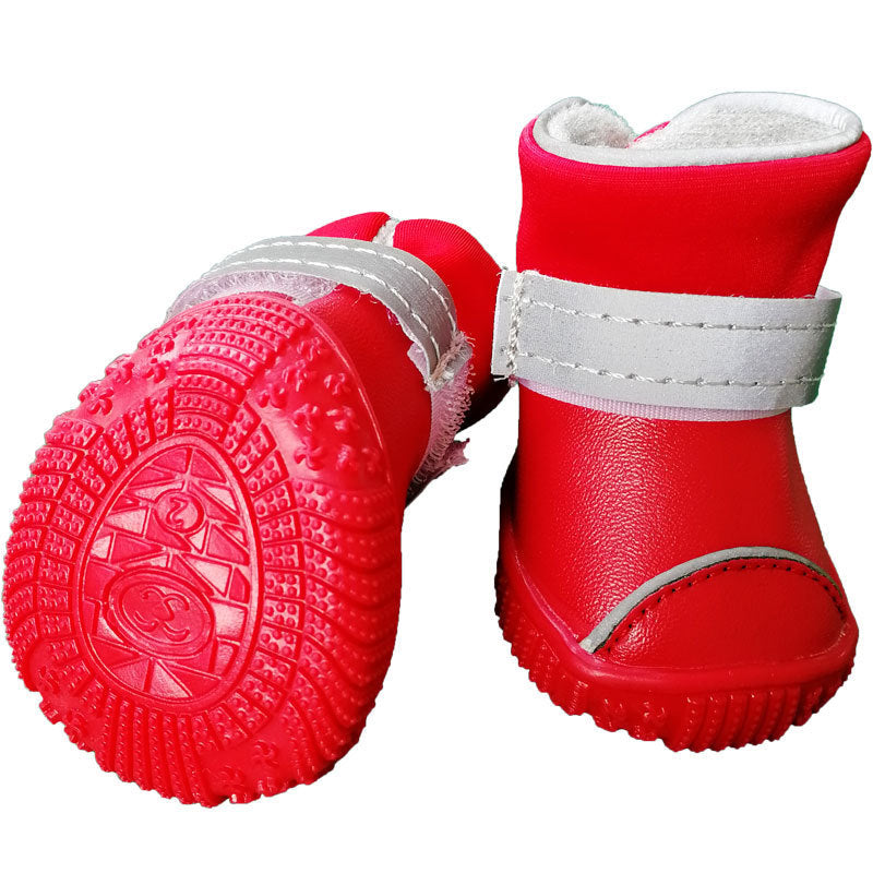 Bottes de pluie étanches rouges pour petits chiens avec semelle antidérapante.