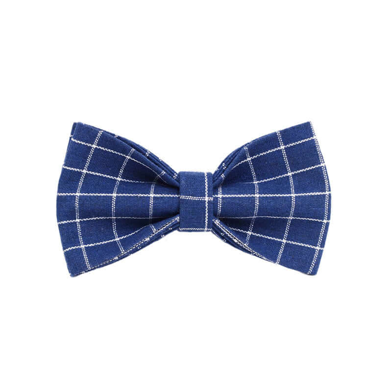 Navy blue plaid bow tie for dogs, stylish accessory for pets, perfect for special occasions.